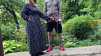 Mommy MILF pissing standing up in the city park after helping her stepson piss