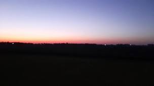 GF pissing behind the barn at sunset