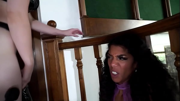 The ebony lesbian slave girl must clean up the pee with her tongue.