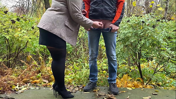 Depraved housewife helps neighbor pee on the street