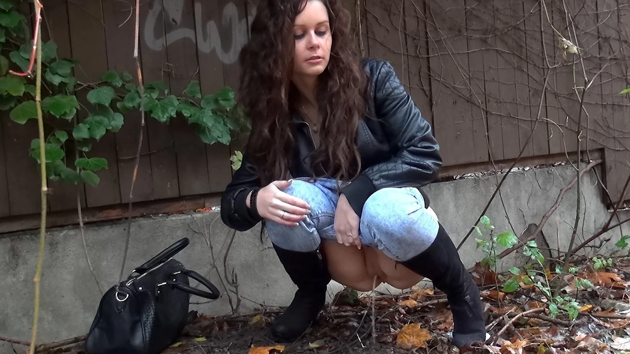 Shy Brunette Tries Public Pissing